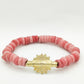 CAMÉLÉON.             Bracelet rose.                Perle akan couleur or