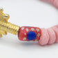 CAMÉLÉON FLORAL - Bracelet rose et rouge en perles africaines Krobo
