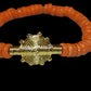 CAMÉLÉON.          Bracelet orange                           Perle akan couleur or
