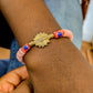 CAMÉLÉON FLORAL - Bracelet rose et rouge en perles africaines Krobo