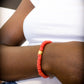 CAMÉLÉON DORÉ - bracelet rouge- perles africaines krobo