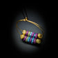 GNONLIVI- Boucles d'oreilles créoles en perles de verre recyclé - Vertes et Violettes