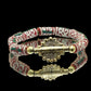 ALVÉOLE.                  bracelet rouge et beige- Perle akan couleur or